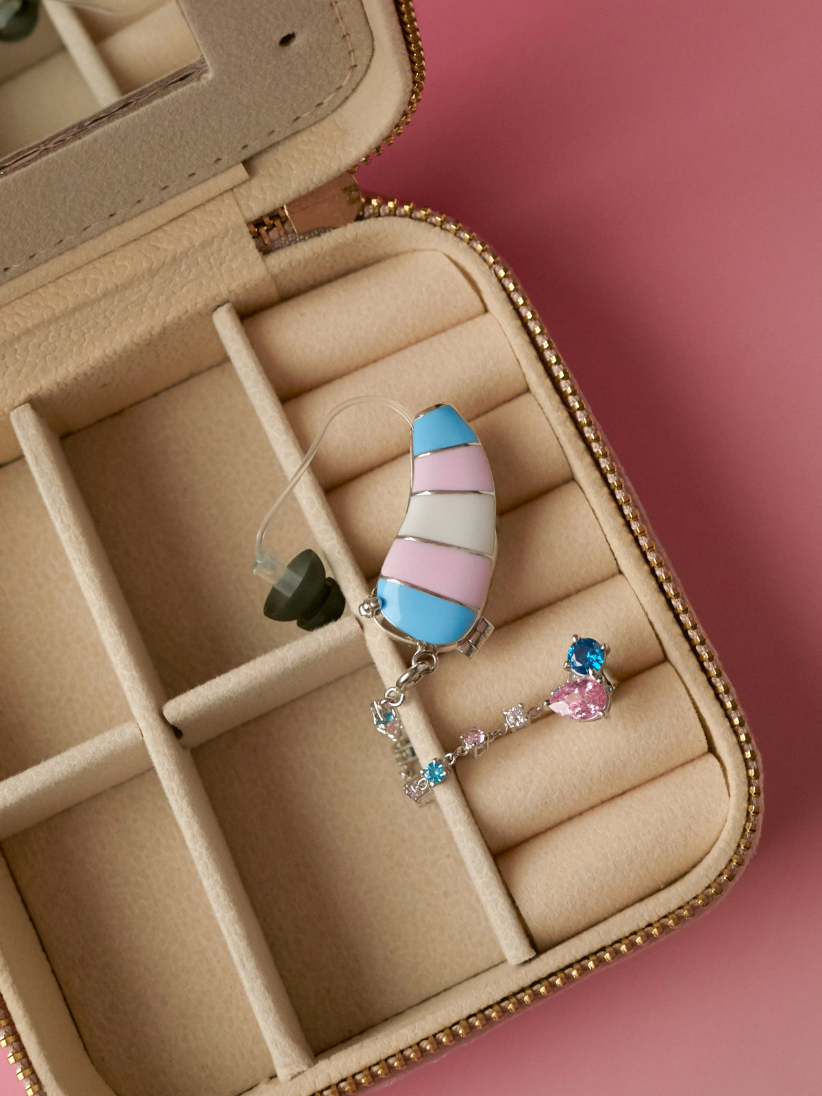Trans Pride jewellery cover and matching chain in an open jewellery case