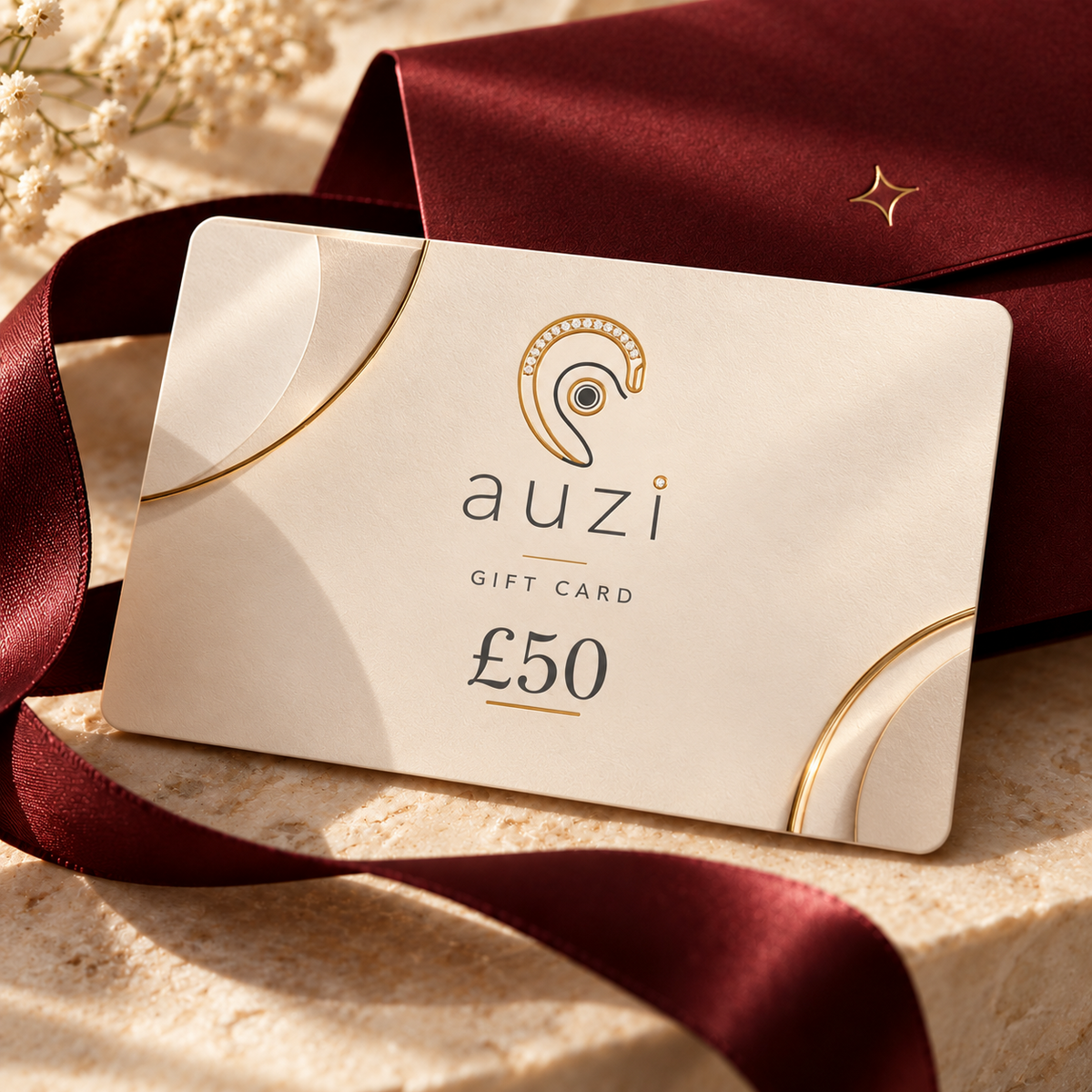 Auzi £50 digital gift card in burgundy presentation setting