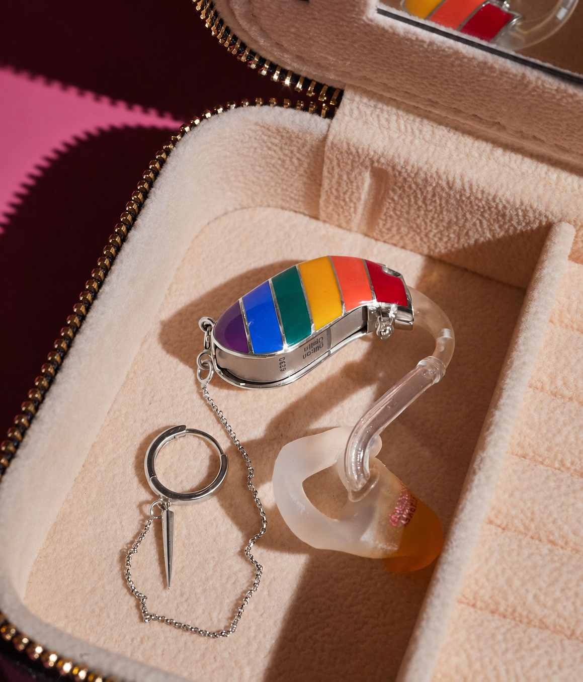 Loud & Proud in silver with rainbow enamel — digitally recoloured preview