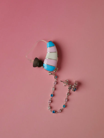Full view of Trans Pride hearing aid jewellery with matching chain