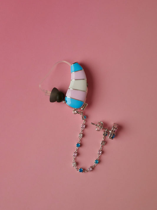 Full view of Trans Pride hearing aid jewellery with matching chain