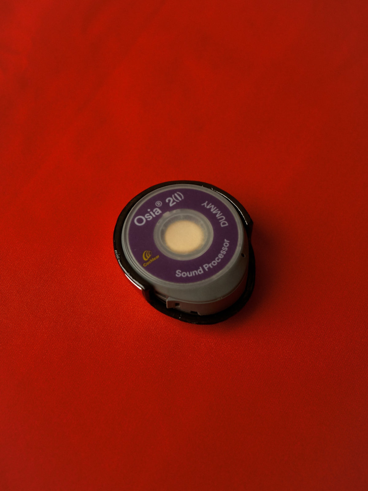 Cochlear Osia 2 sound processor backing and attachment view