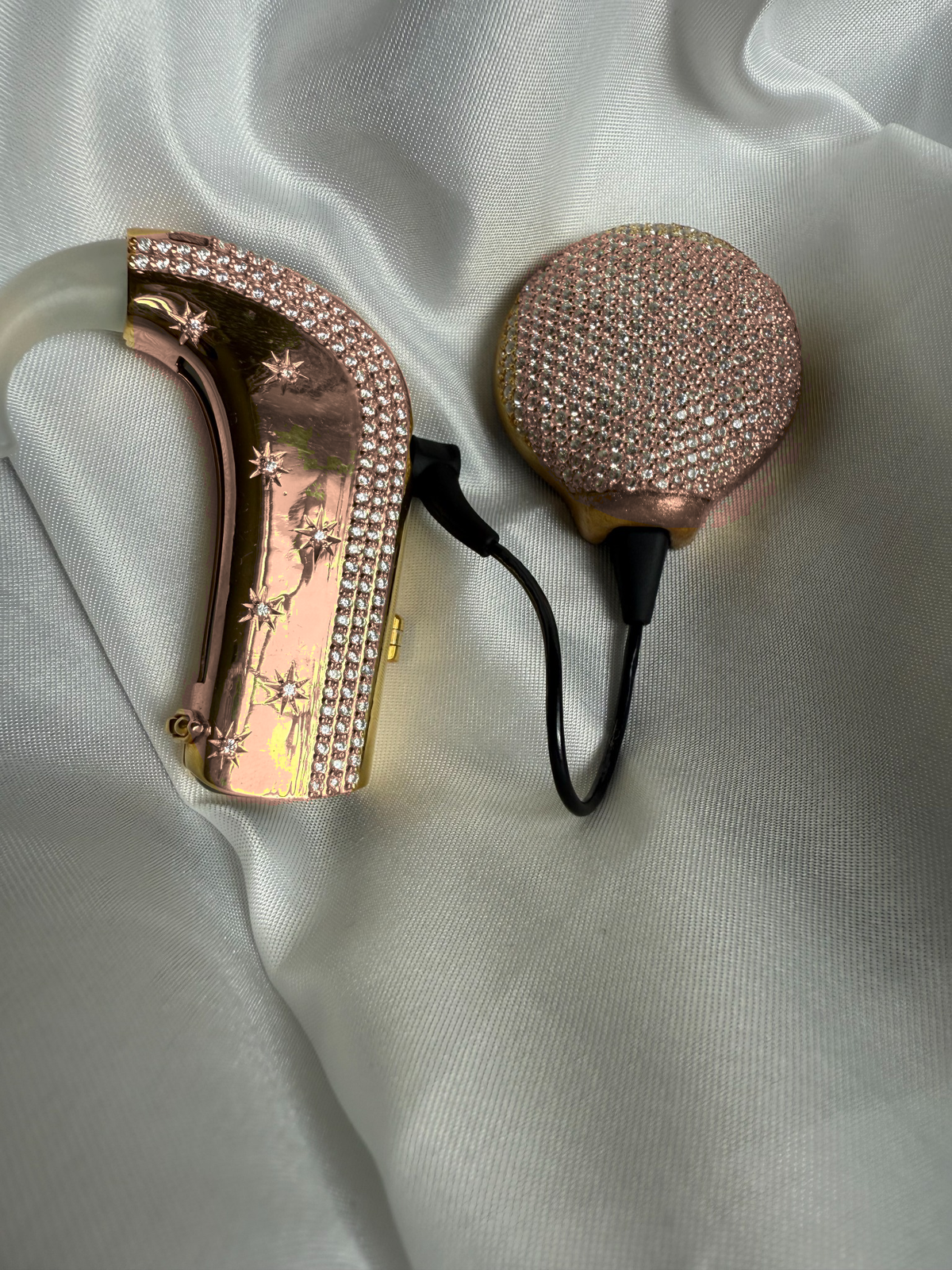 Shine Bright cochlear jewellery in rose gold vermeil with white stones