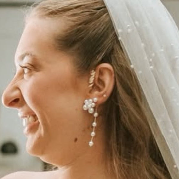 Bride wearing Auzi HEARLOOM hearing aid jewellery on her wedding day